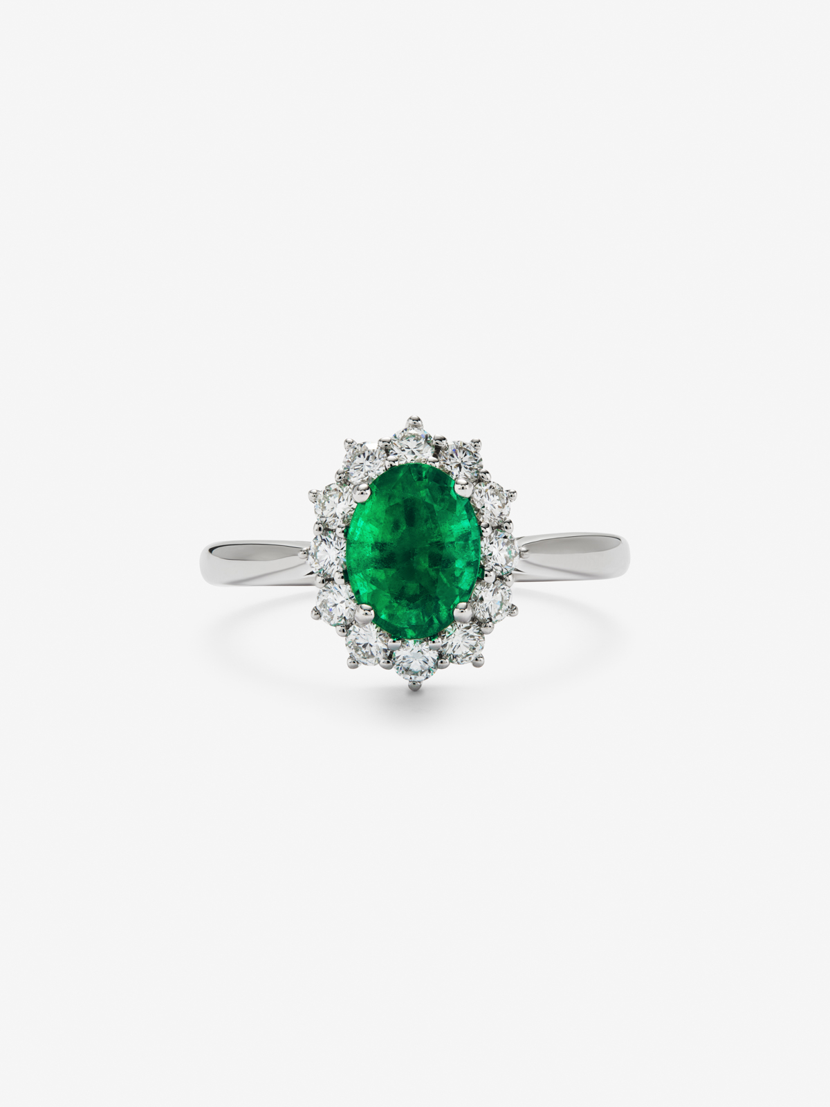 18K white gold ring with oval-cut green emerald of 1.42 cts and 12 brilliant-cut diamonds with a total of 0.45 cts