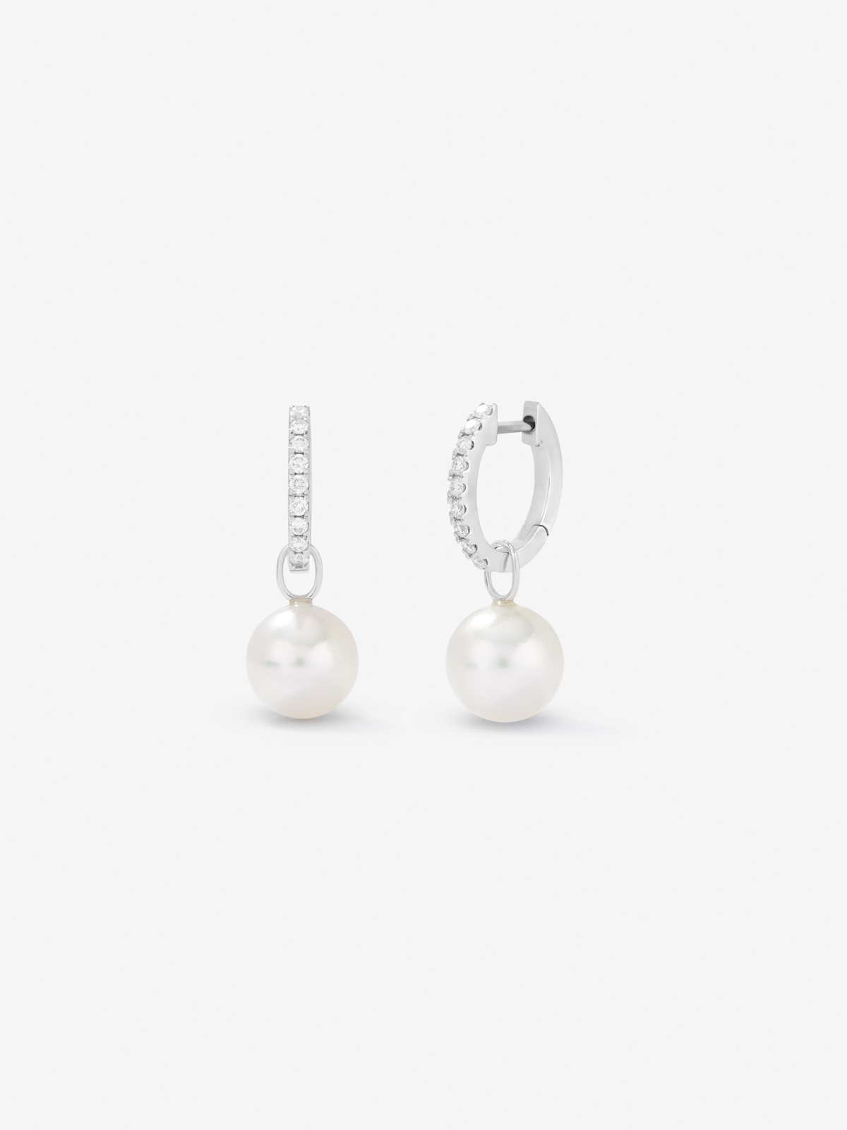 18k white gold hoop earring with 8.5mm Akoya pearl pendant and diamond.