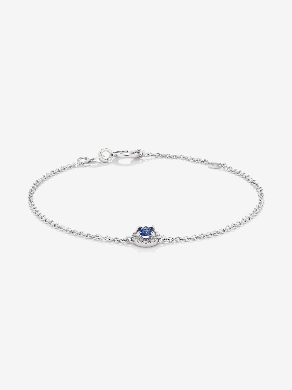 18K white gold bracelet with 10 brilliant-cut diamonds with a total of 0.06 cts and a brilliant-cut blue sapphire of 0.25 cts