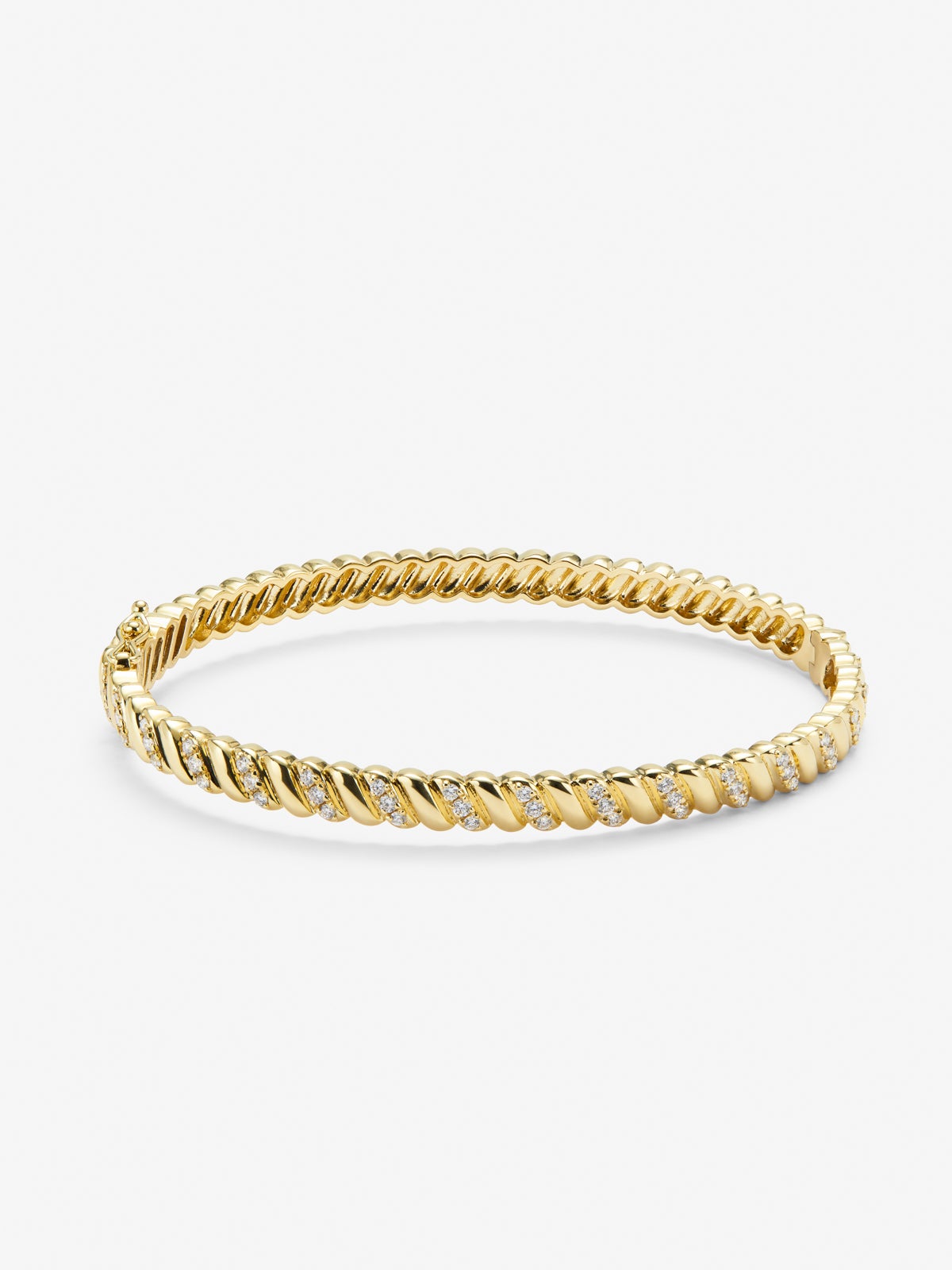 Rigid yellow gold bracelet of 18k with white diamonds in 0.58 cts