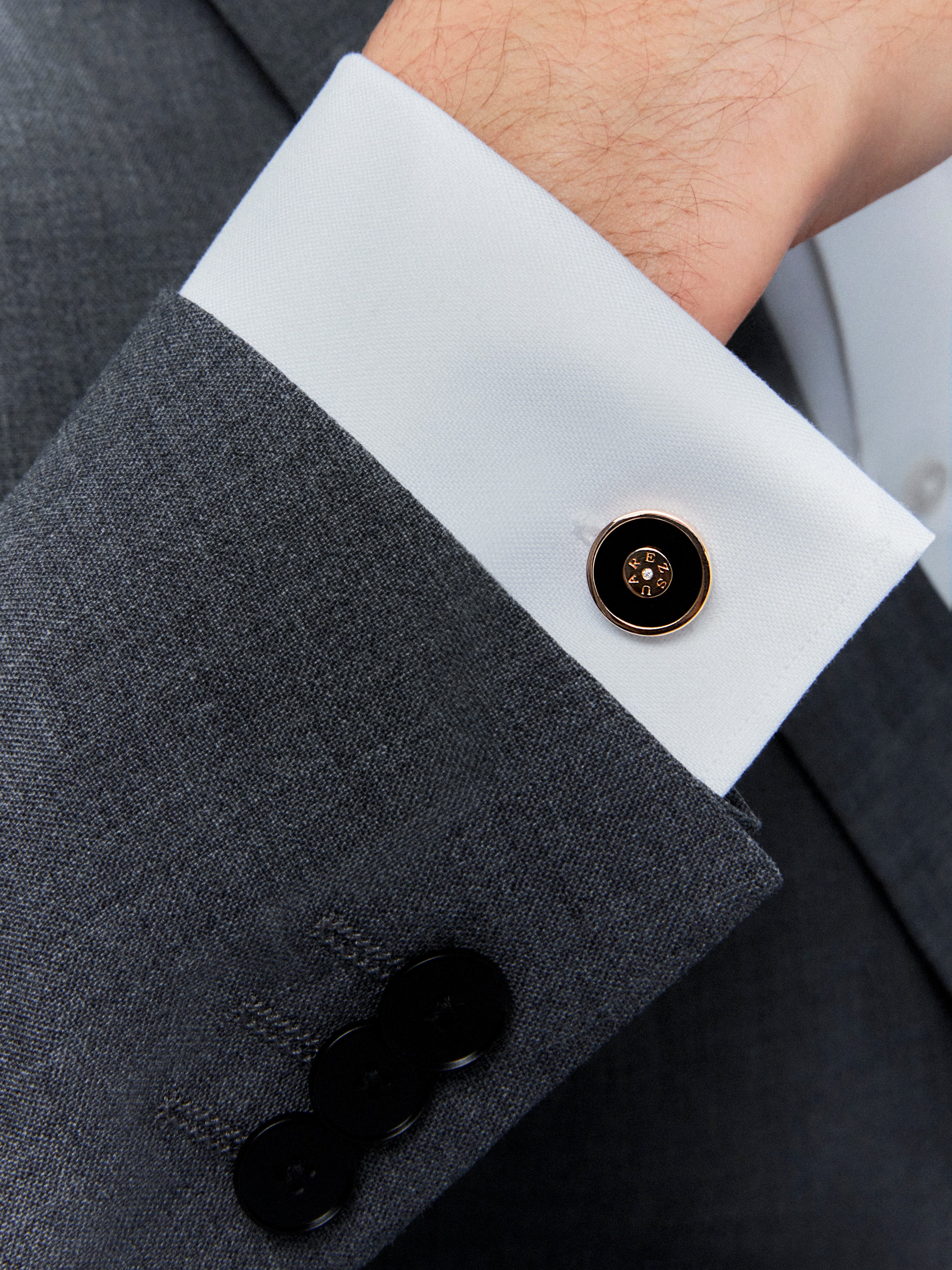 18K rose gold cufflinks with black onyx and 2 brilliant-cut diamonds with a total of 0.006 cts