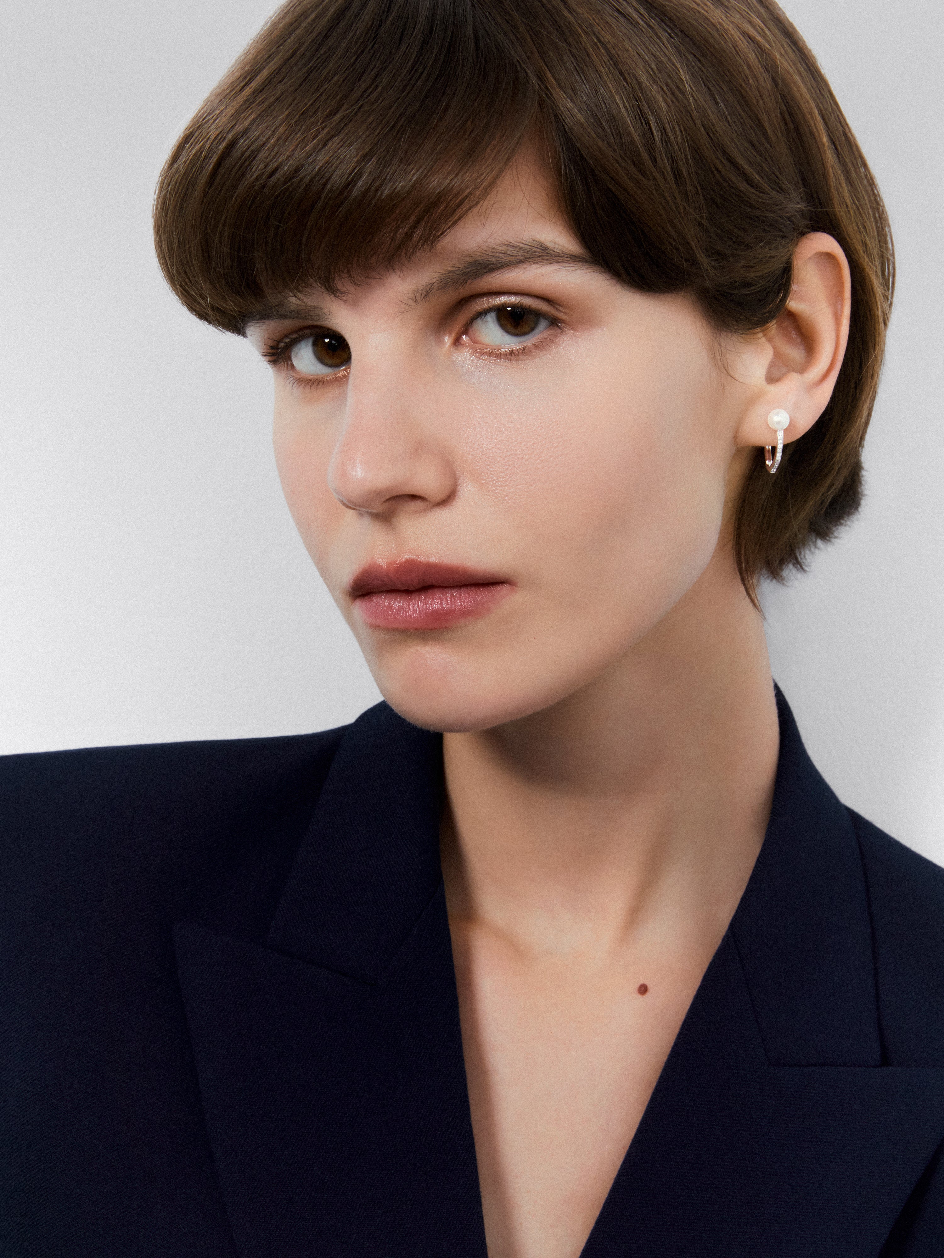 18k white gold hoop earrings with 6mm Akoya pearl.