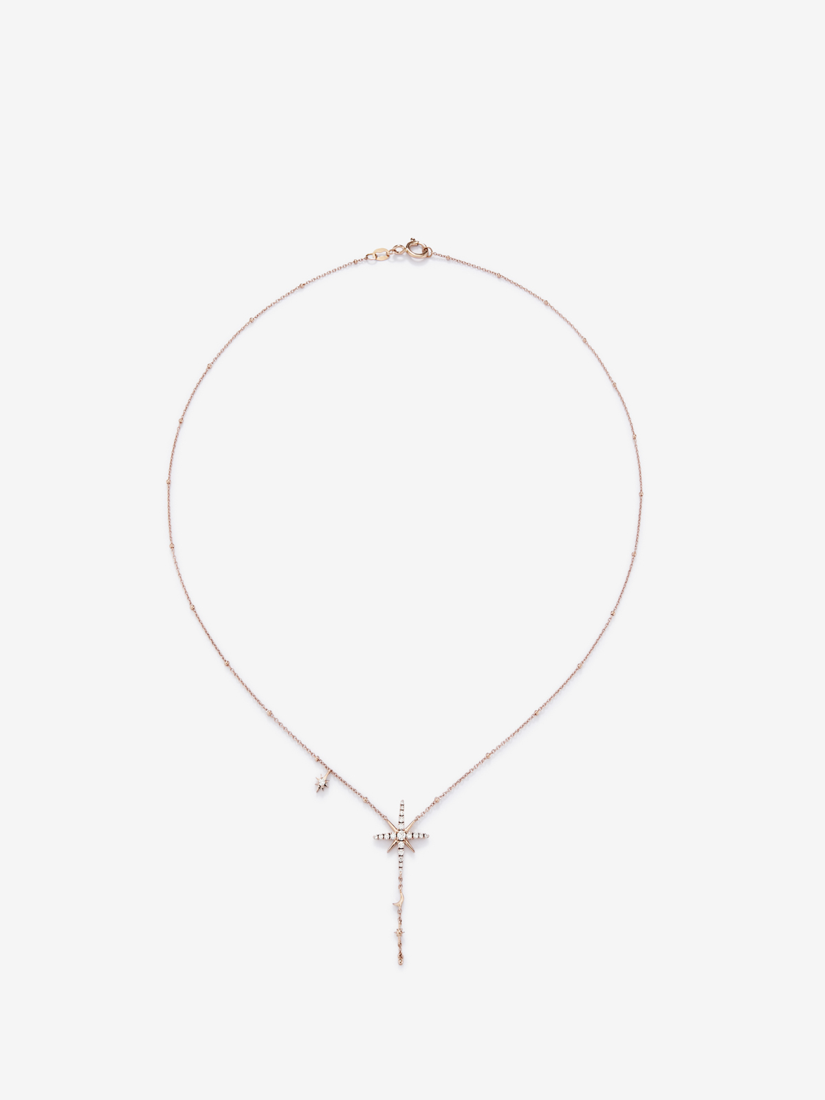Long chain pendant with 18K rose gold star with diamonds