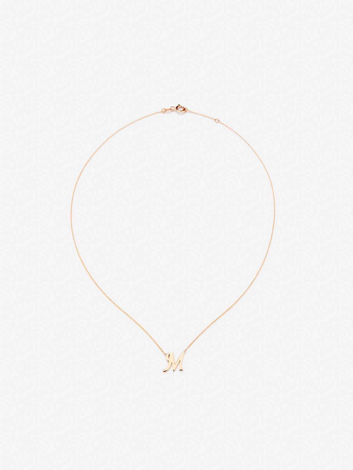 Pendant chain with initial 'm' in 18K rose gold.