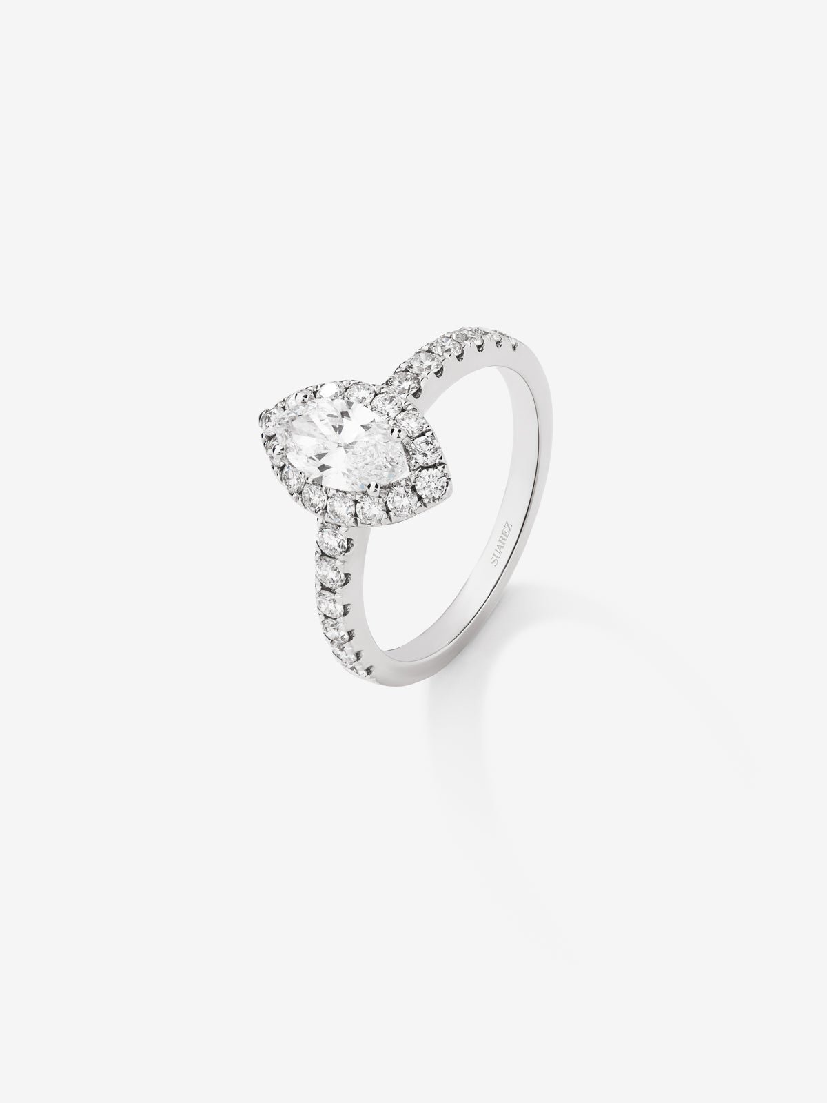 18K white gold ring with 0.7 ct marquise cut diamond and brilliant cut diamond border and arm with a total of 0.63 cts