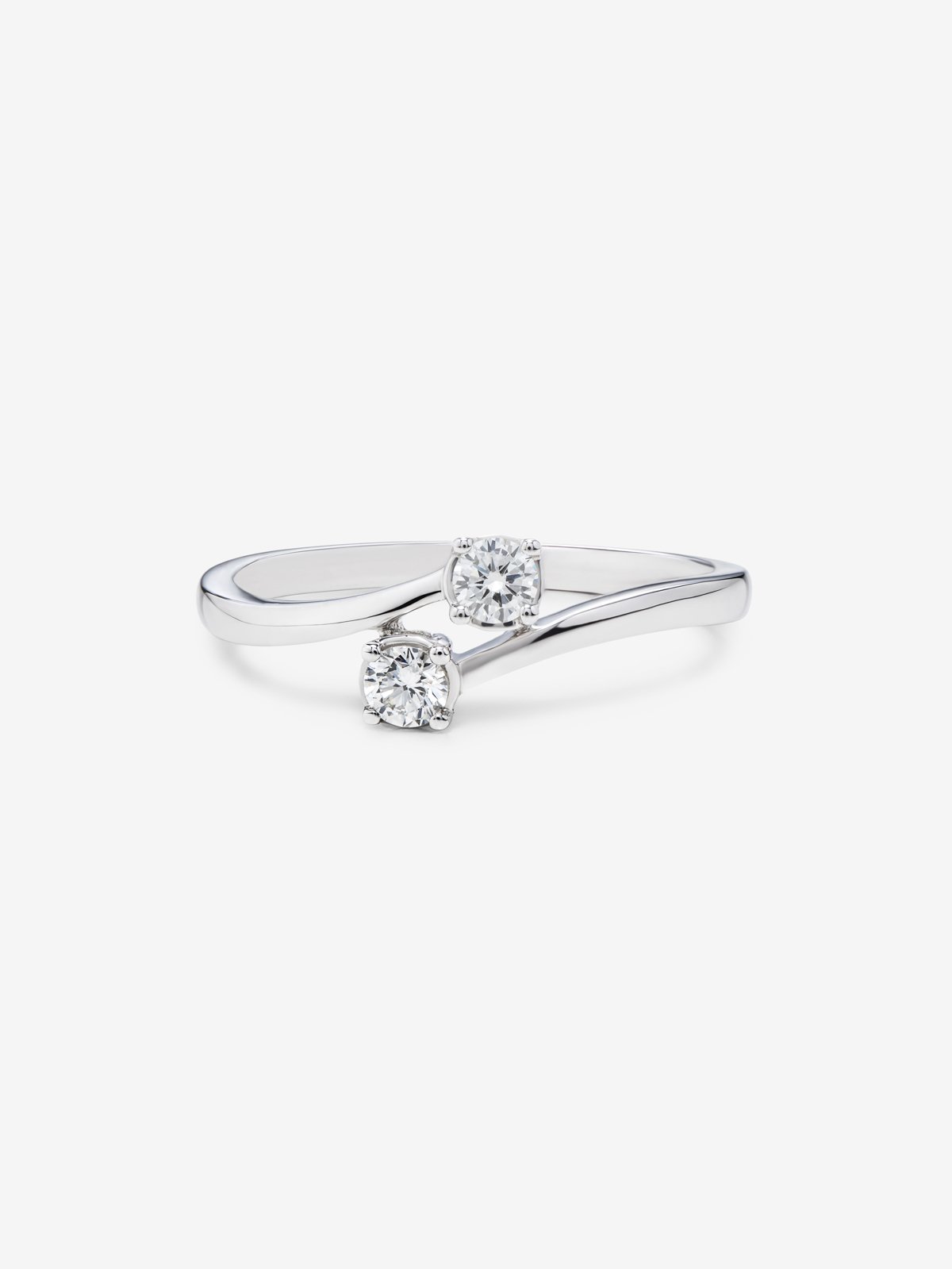 Anillo tú y yo de oro blanco de 18K con 2 diamantes en talla brillante con un total de 0,19 cts