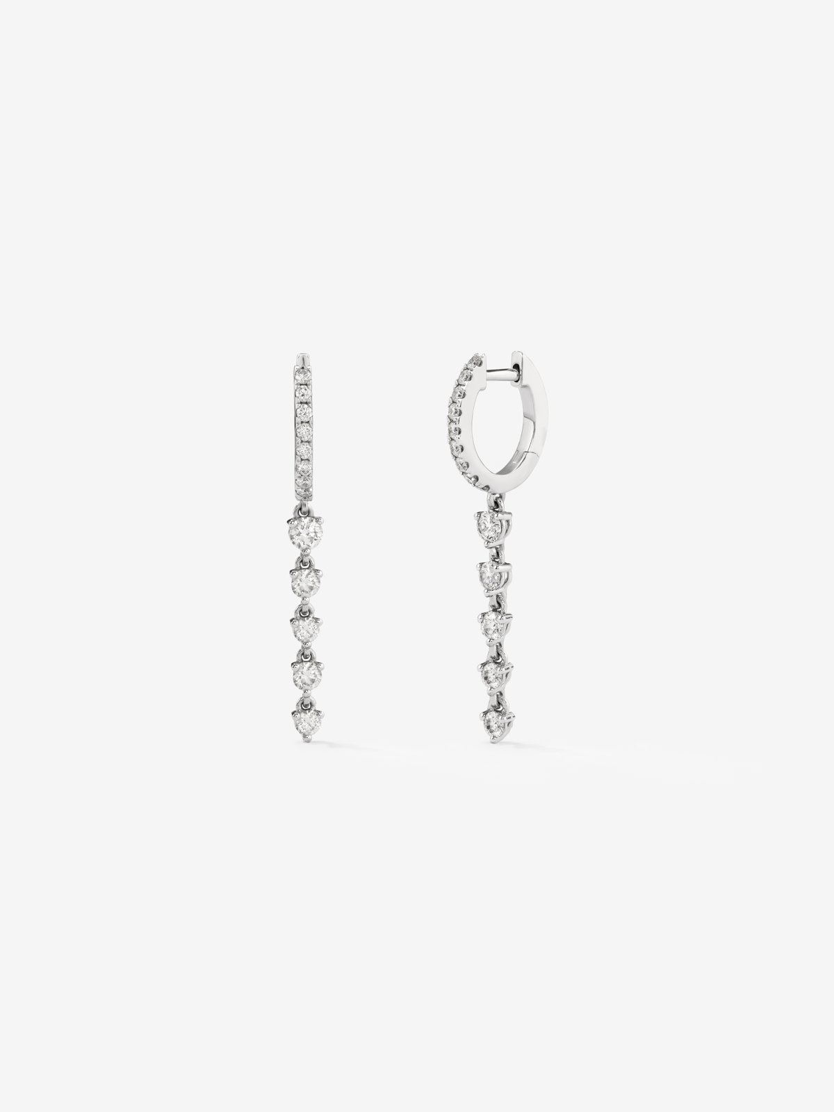 Long hoop earrings made of 18K white gold with diamonds.