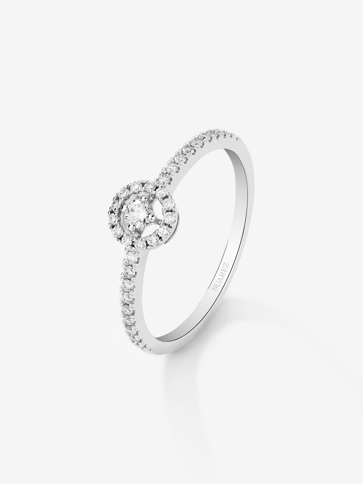 18K white gold ring with central brilliant-cut diamond of 0.06 cts and border and arm of 33 brilliant-cut diamonds with a total of 0.18 cts