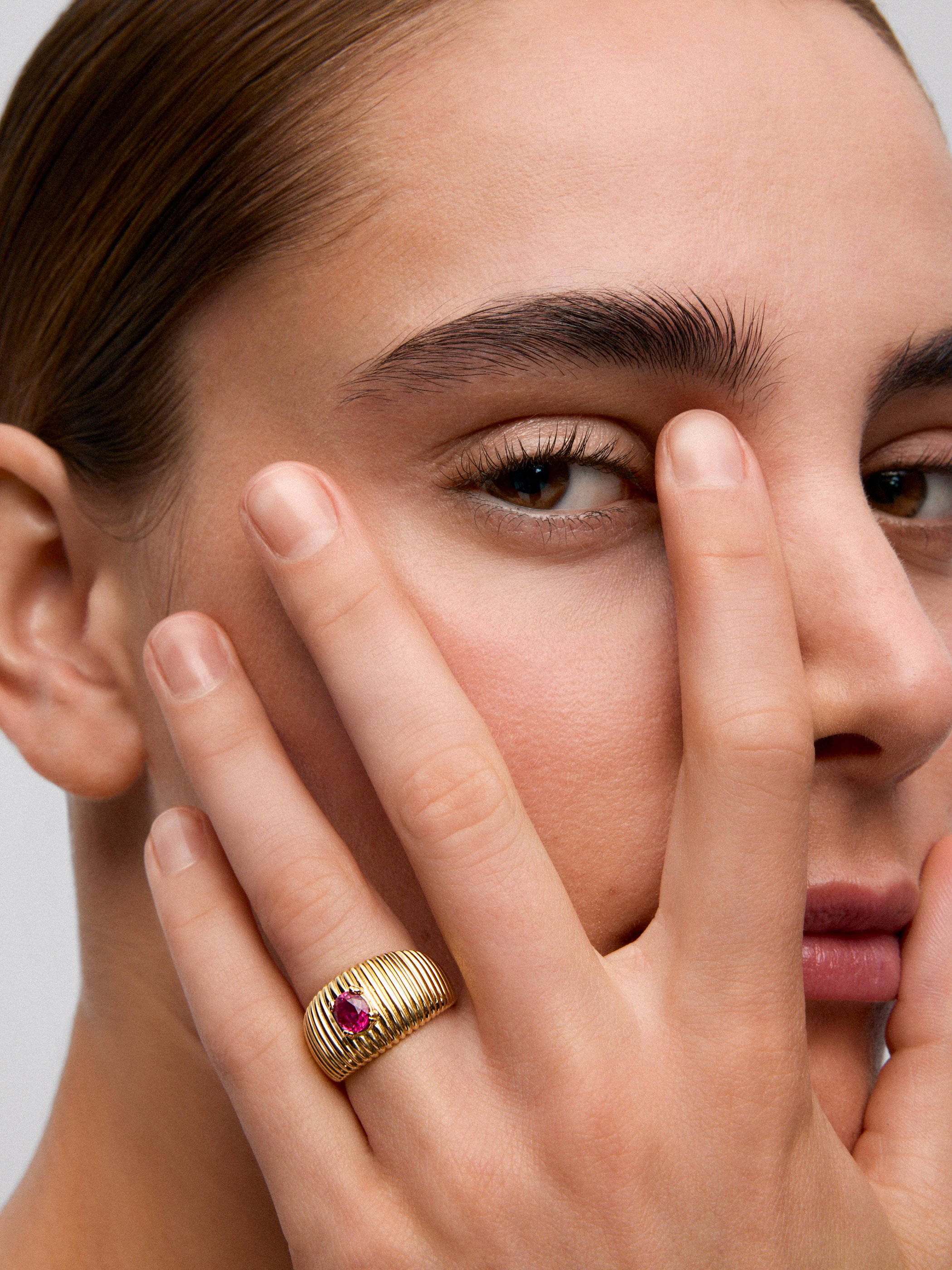 18K Yellow Gold Fluted Ring with Oval Cut Ruby
