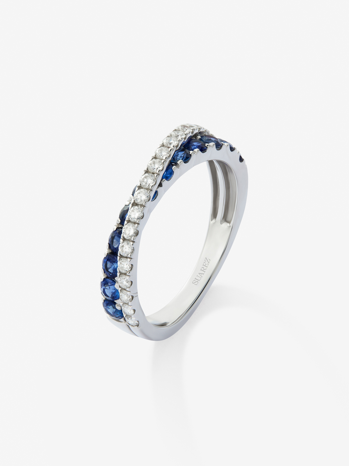 18K white gold crossover ring with sapphire and diamond