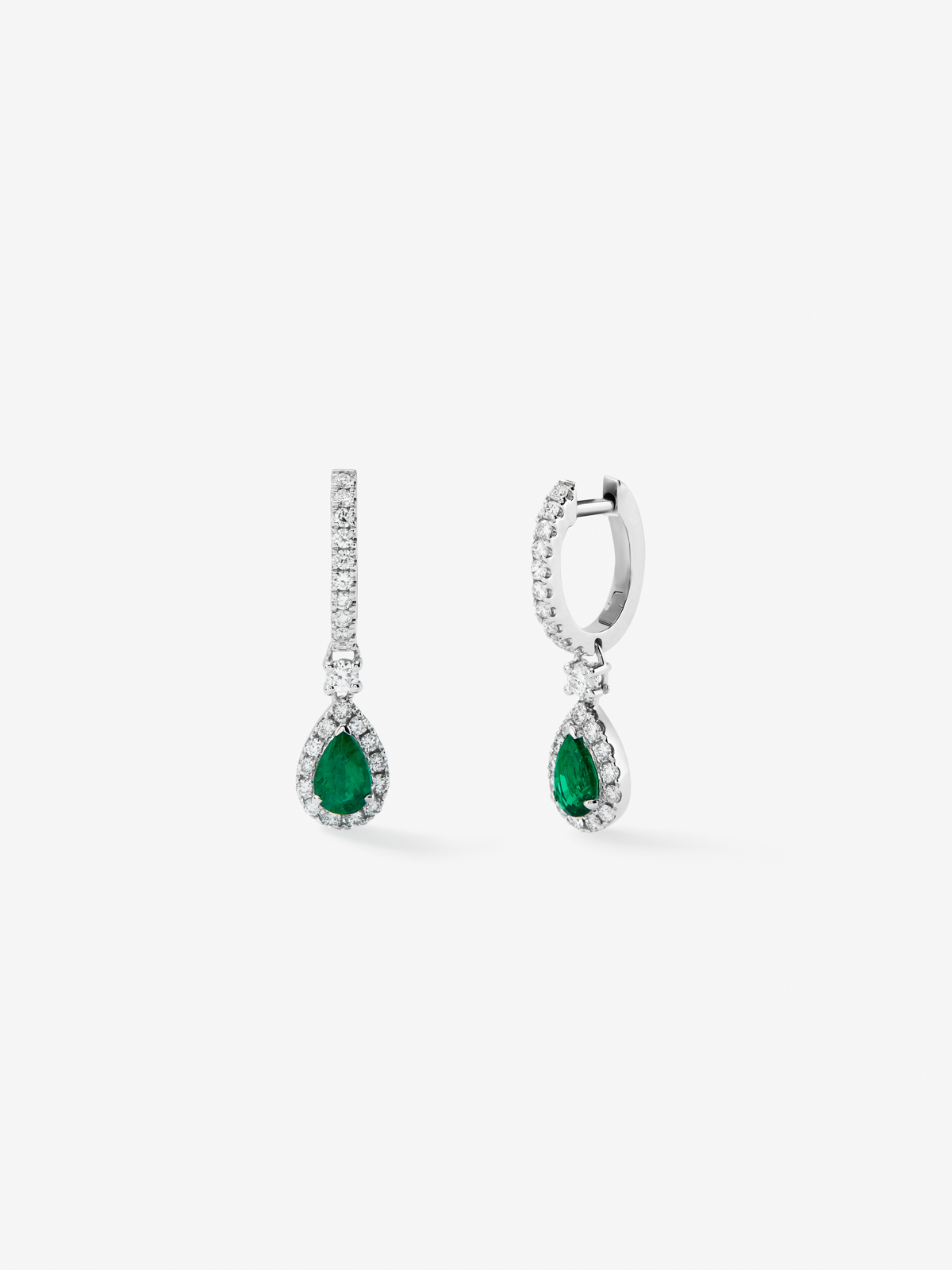 18K white gold earrings with green emeralds in 0.73 cts and white diamonds in bright 0.54 cts
