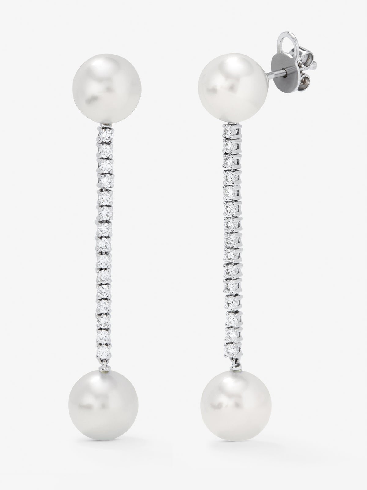 Long 18K white gold pendant earrings with diamond and pearl.