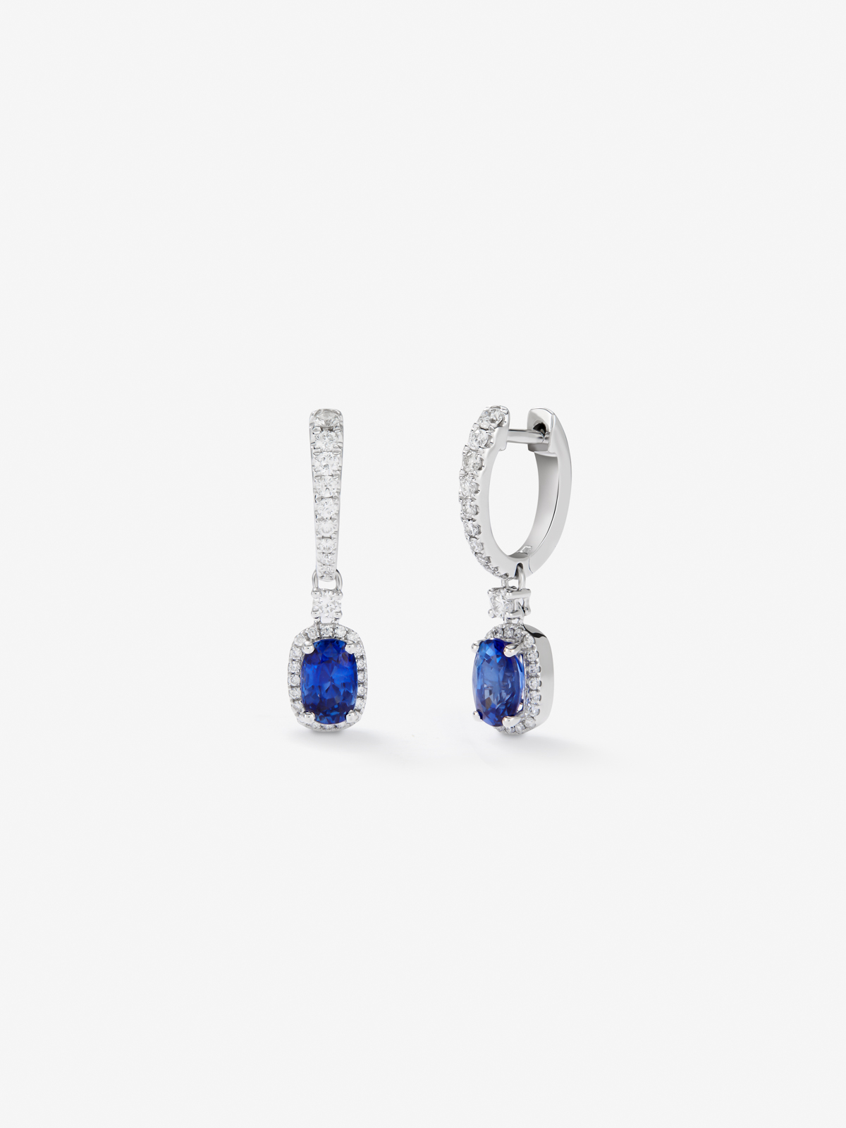 18K white gold earrings with blue zafiros in oval size 1.35 cts and white diamonds in 0.41 cts bright size