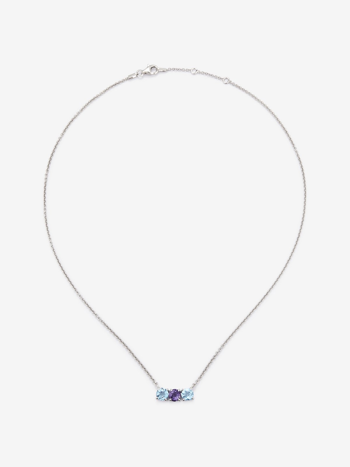 Colgante tresillo de plata 925 con topacios azuls swiss y amatista morada