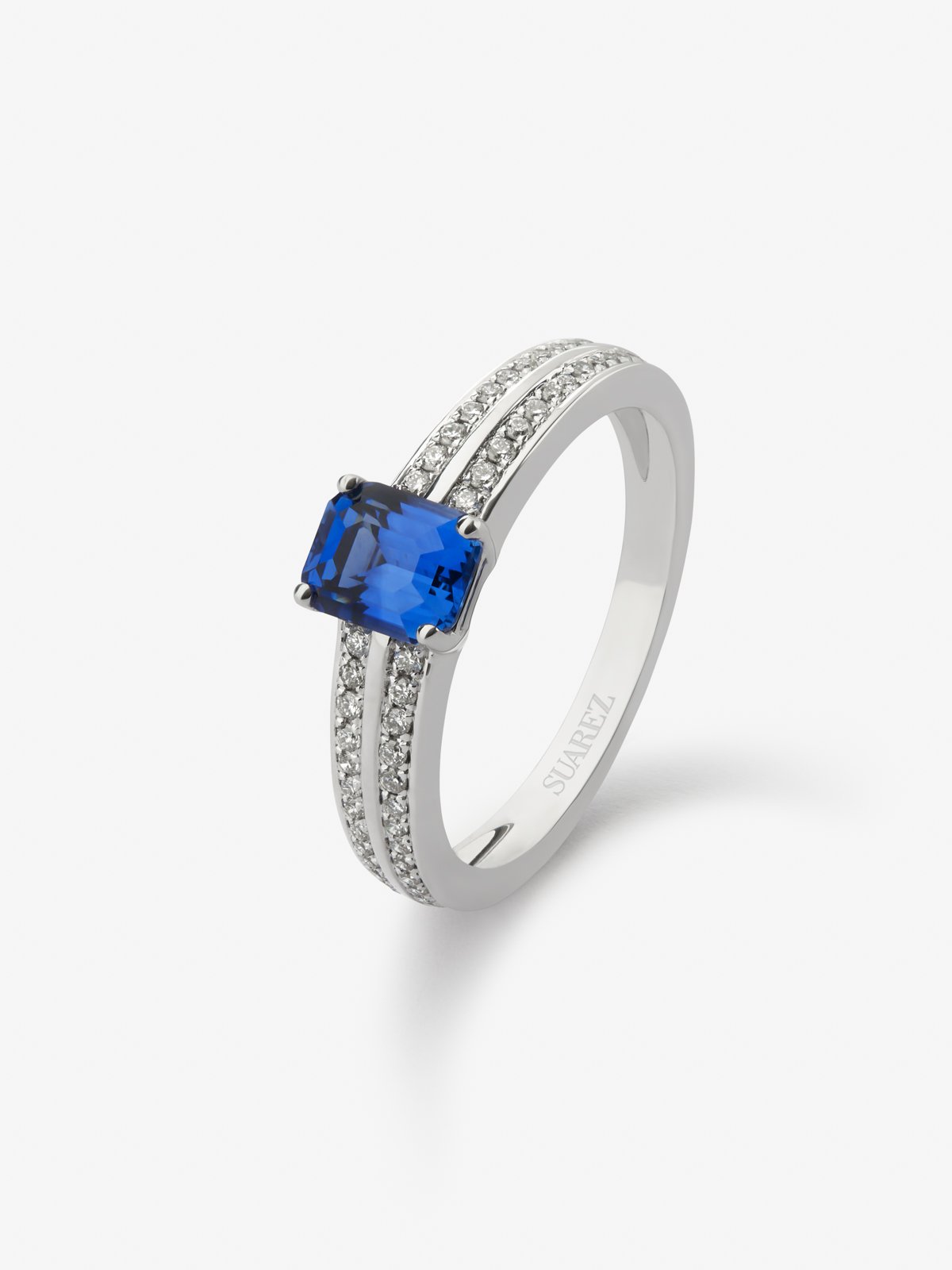 18K white gold ring with vivid blue sapphire in octagonal cut of 1.09 cts and 52 brilliant-cut diamonds with a total of 0.18 cts