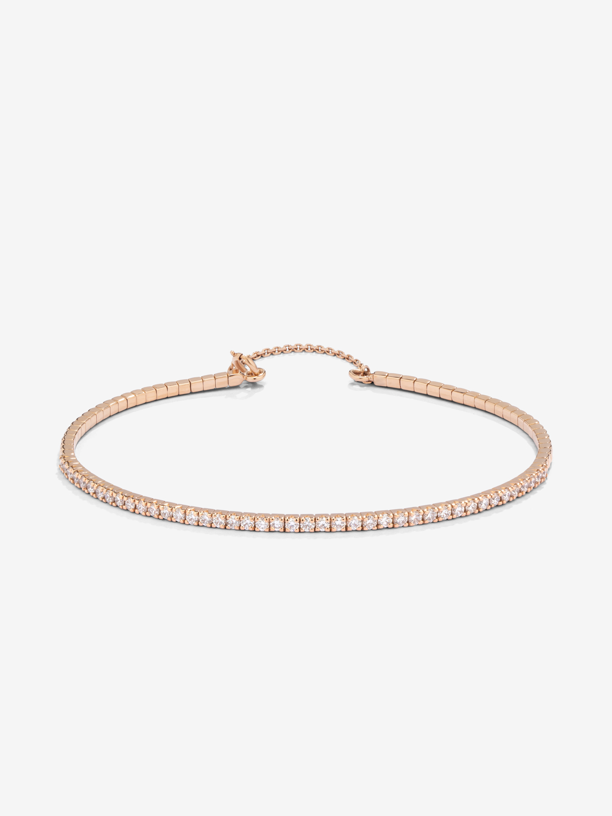 Thin semi-rigid 18K rose gold bracelet with diamonds