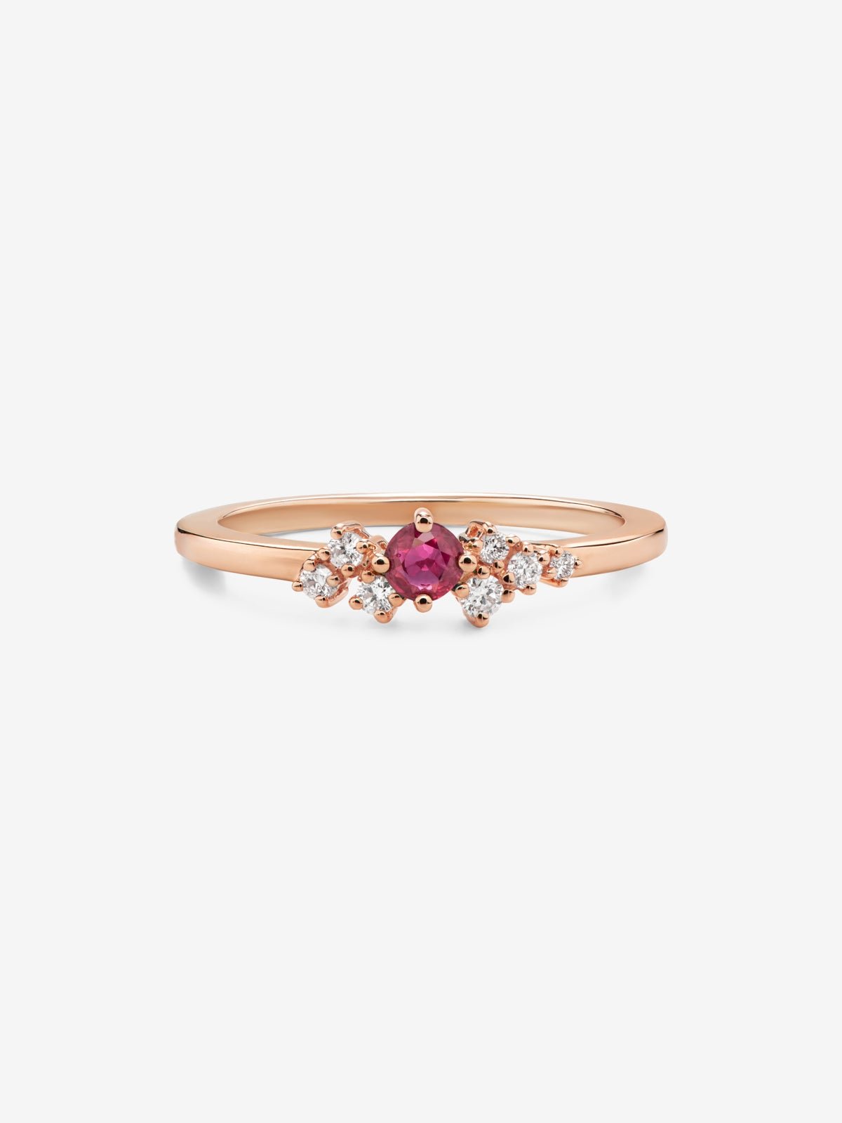 18K rose gold ring with brilliant cut ruby ​​of 0.21 cts and 7 brilliant cut diamonds with a total of 0.1 cts
