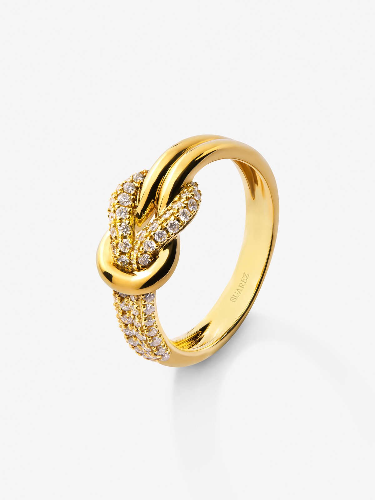 18K yellow gold ring with white diamonds of 0.32 cts and knot shape