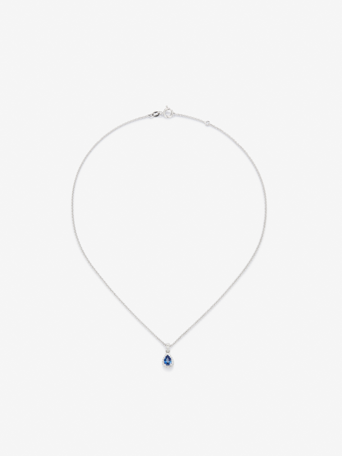 18K white gold pendant with blue zafiro in 0.4 cts and white diamonds in bright 0.08 cts