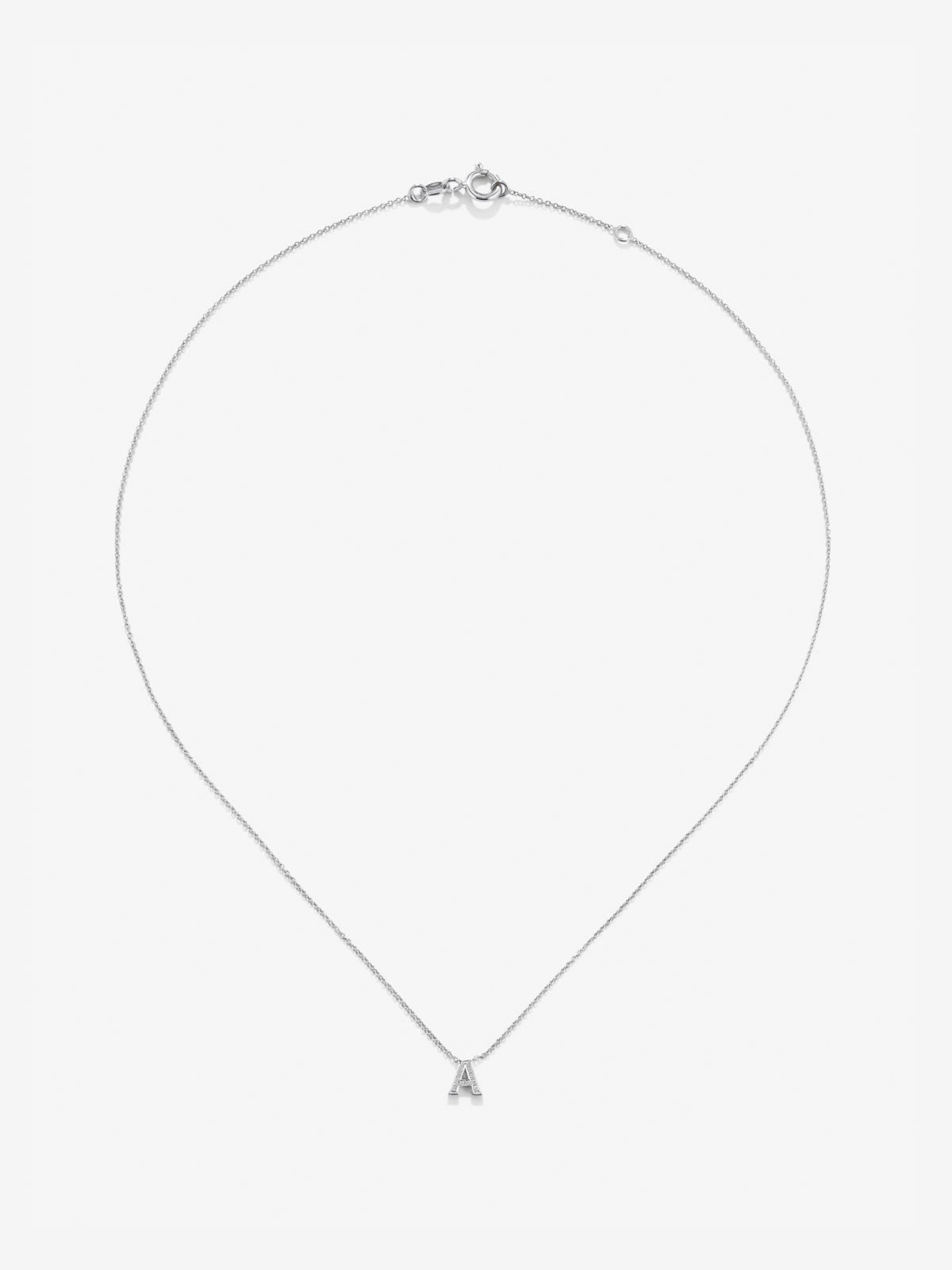 Pendant necklace with small initial in 18K white gold and diamonds.