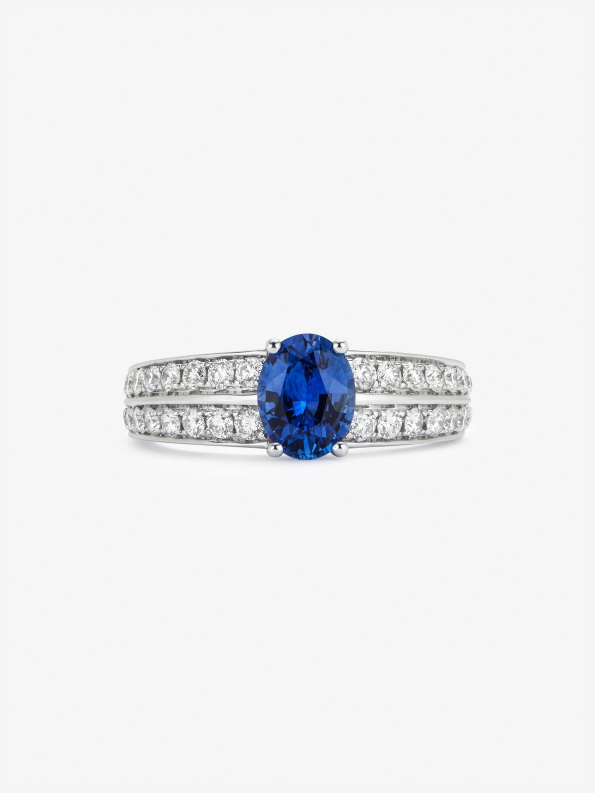 18K white gold ring with vivid blue sapphire in oval cut of 1,292 cts and 32 brilliant cut diamonds with a total of 0.6 cts