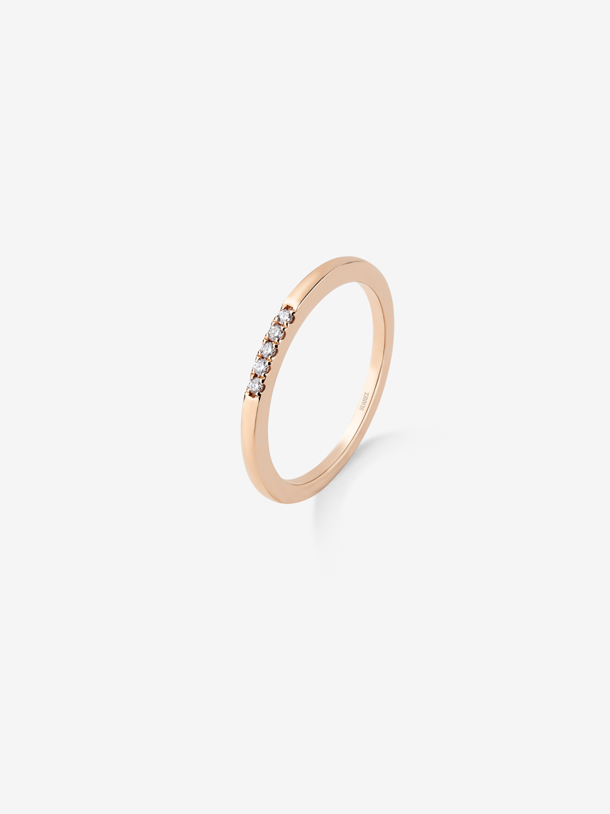 Thin 18K rose gold band ring with diamonds