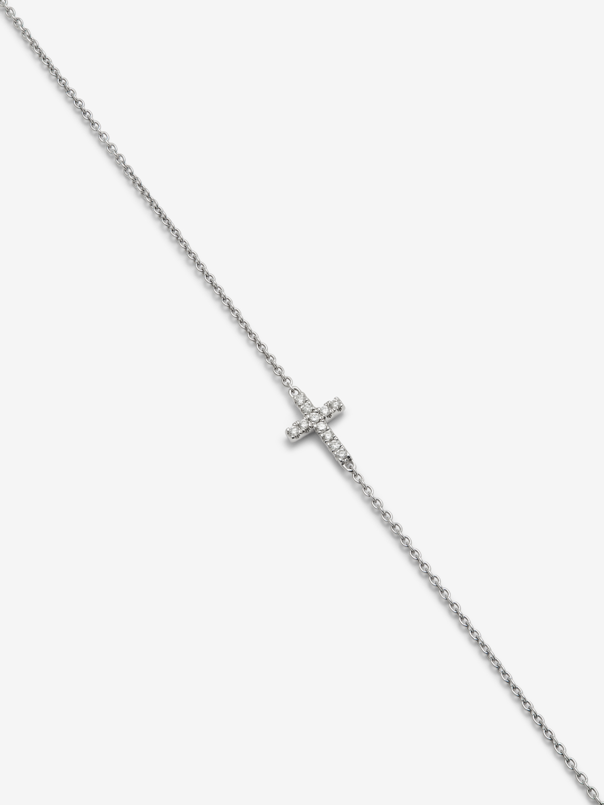 18K white gold bracelet with cross and brilliant-cut diamonds with a total of 0.04 cts