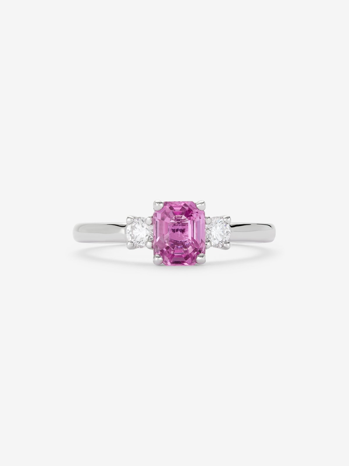 Anillo tresillo de oro blanco de 18K con zafiro rosa en talla octogonal y 2 diamantes en talla brillante con un total de 0,20 cts