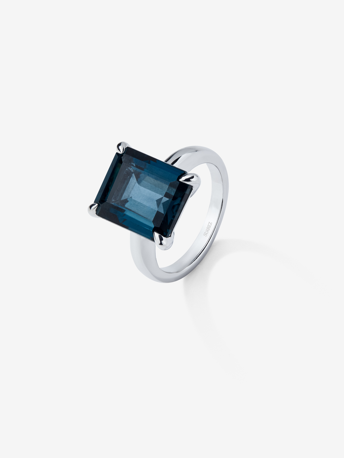 Silver ring with London blue topaz stone