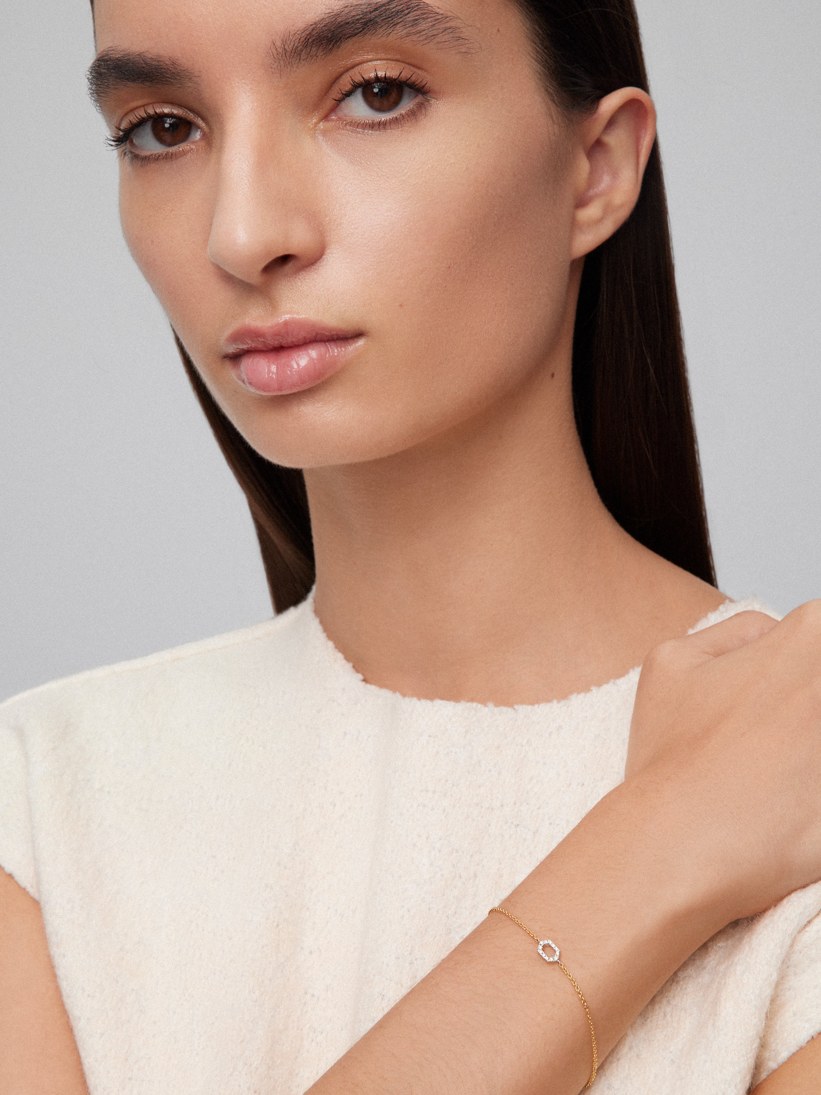 Pulsera de oro blanco y amarillo de 18K con diamantes blancos en talla brillante de 0,03 cts