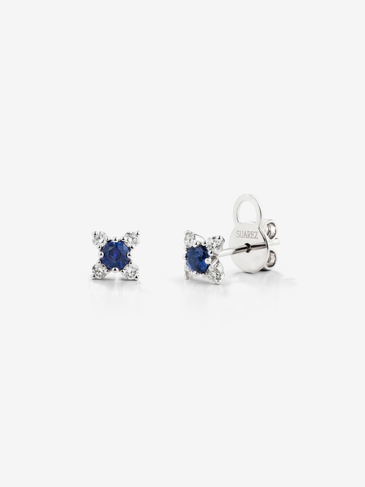18K white gold flower earrings with sapphire and diamonds.