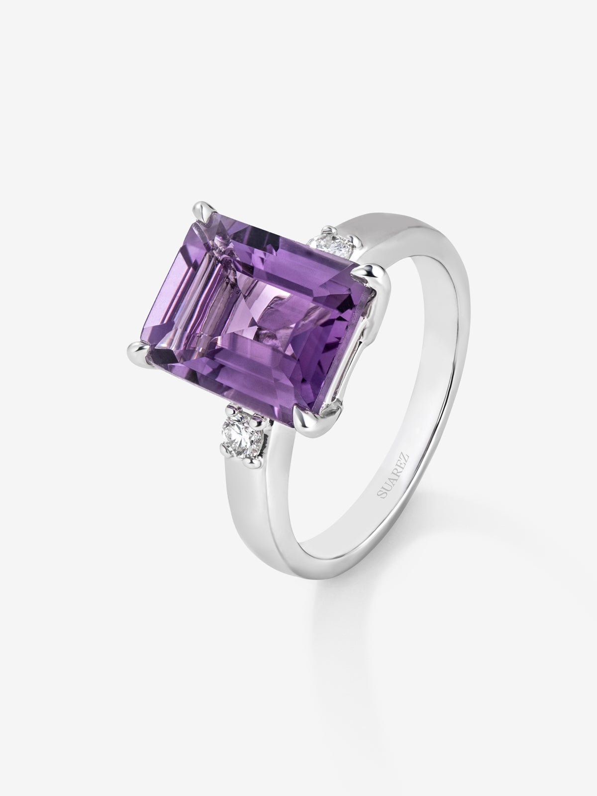 Silver ring with purple amethyst and diamonds
