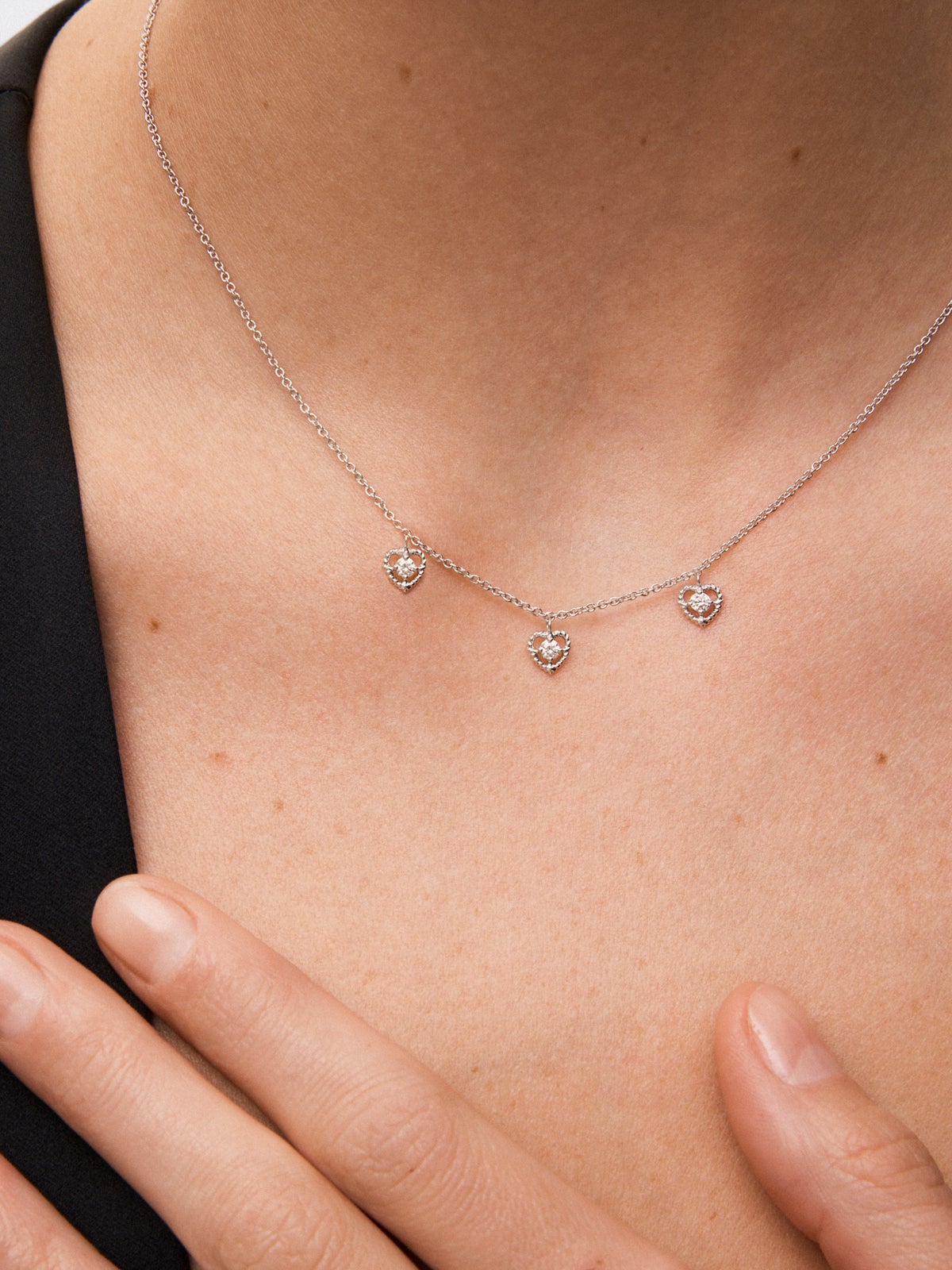 18K white gold heart pendant with 3 brilliant-cut white diamonds with a total of 0.18 cts