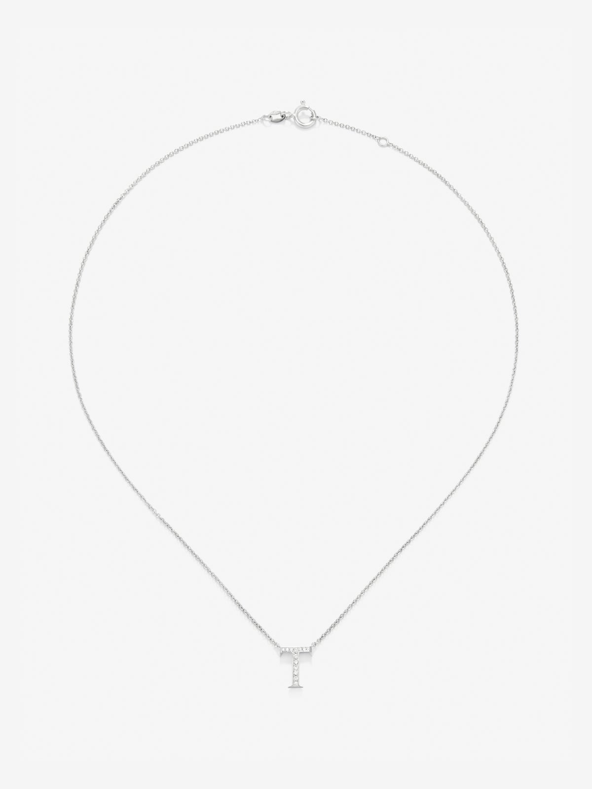Colgante de oro blanco de 18K con letra T y 13 diamantes en talla brillante con un total de 0,05 cts