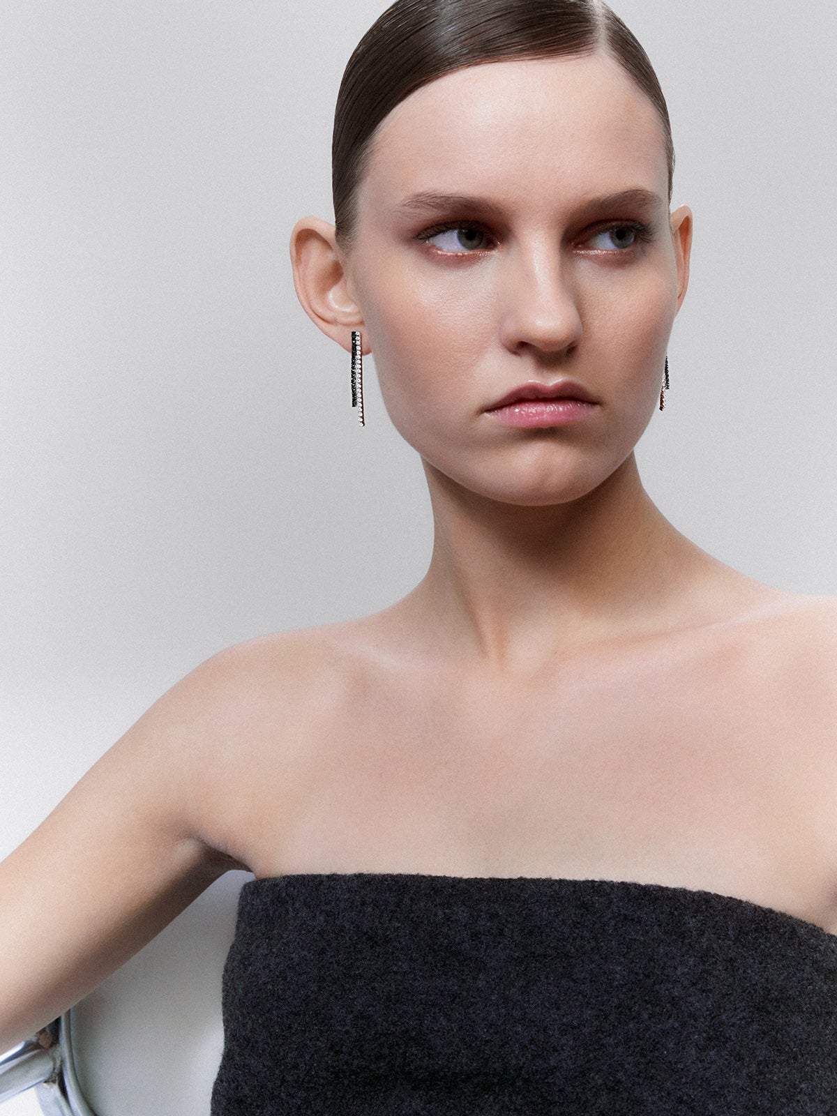 18K white gold pendant earrings with black diamond and white diamond.