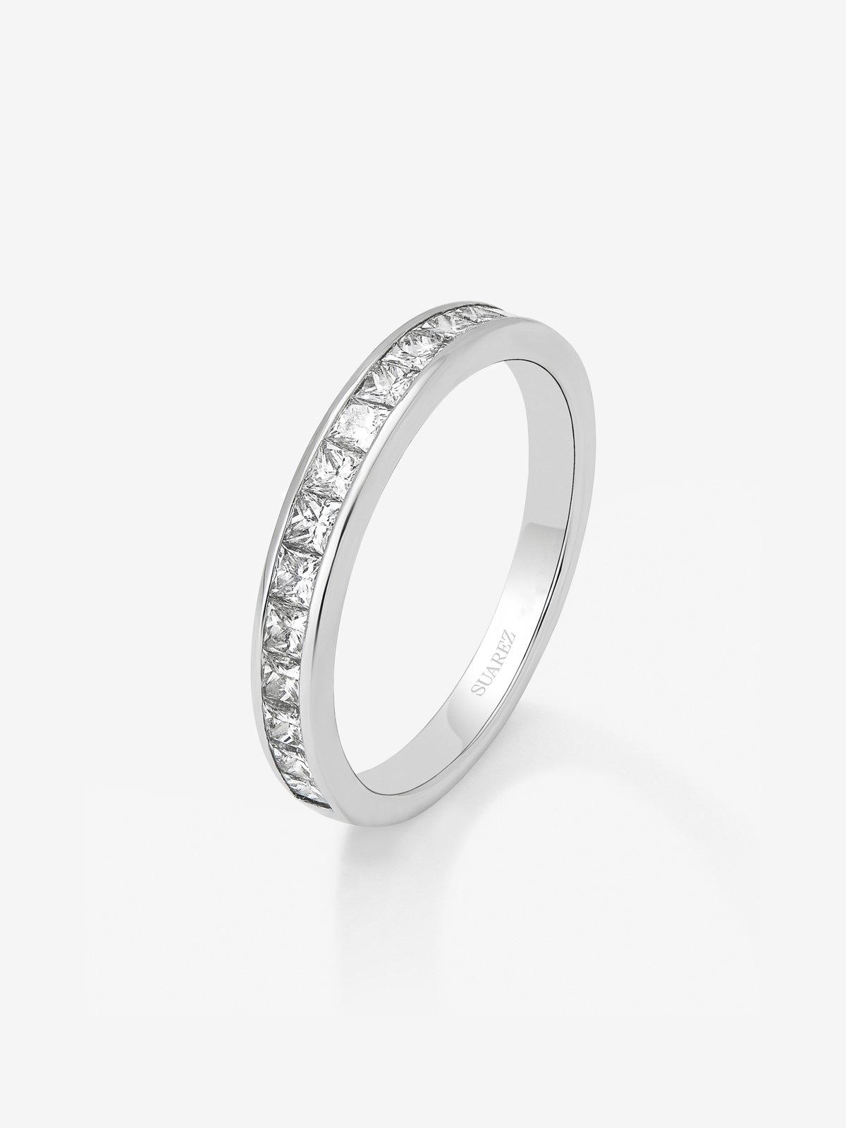 Half eternity engagement ring in 18K white gold with princess cut diamonds on a 0.70ct rail.