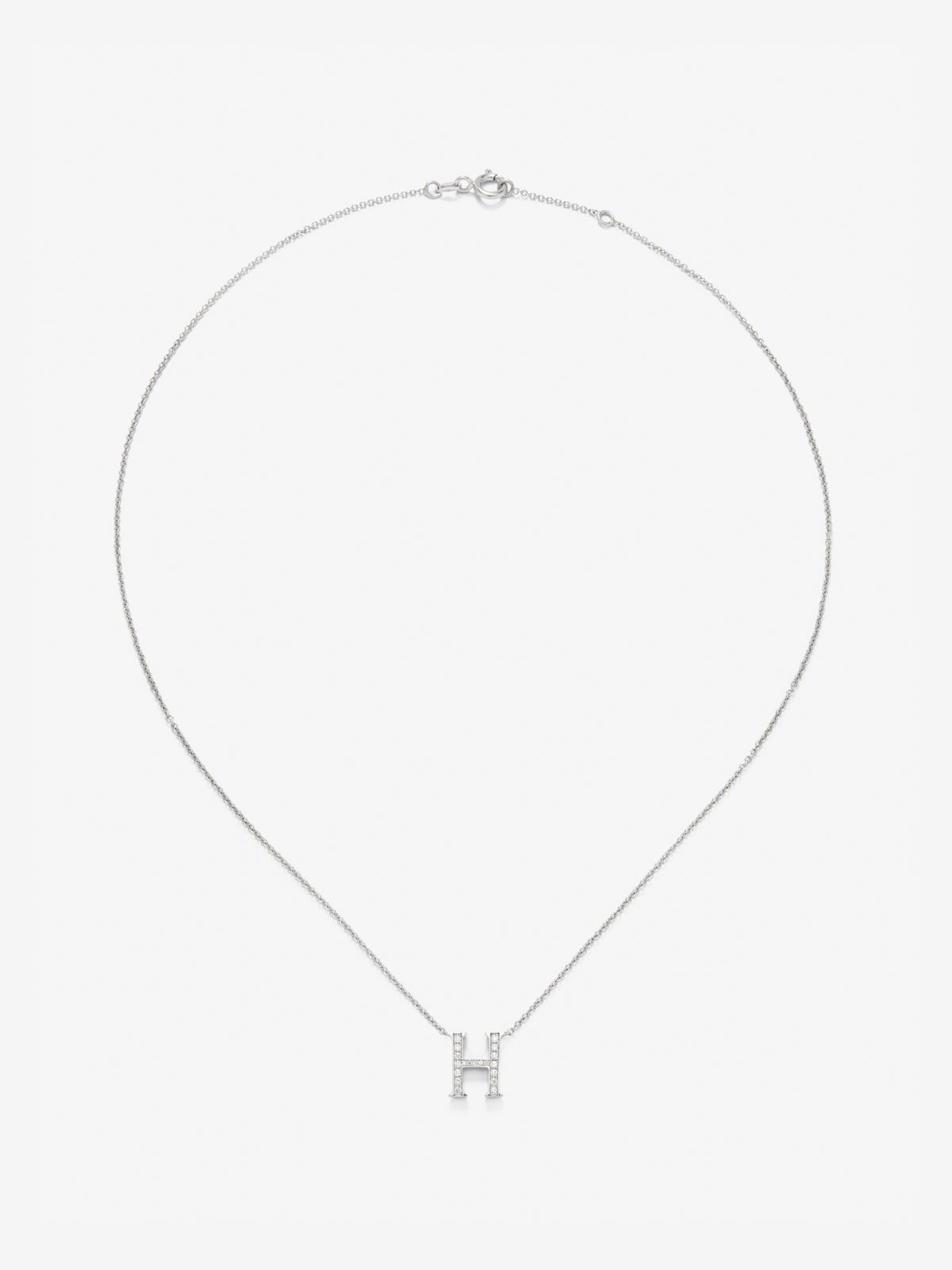 Colgante de oro blanco de 18K con letra H y diamantes en talla brillante
