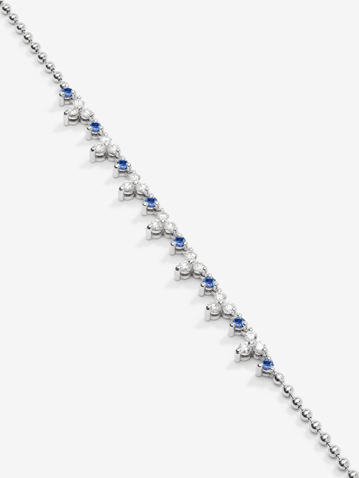 18K white gold pendant with blue zafiros in bright size 1.35 cts and white diamonds of 1.25 cts
