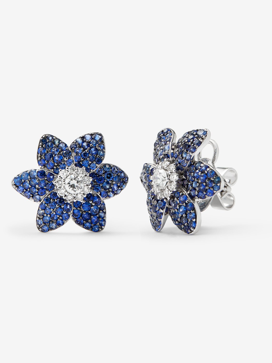 18kt white gold flower earrings with diamonds and blue sapphires