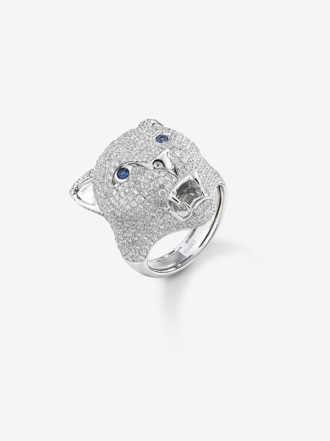 Anillo puma de oro blanco de 18kt con diamantes y zafiros azules