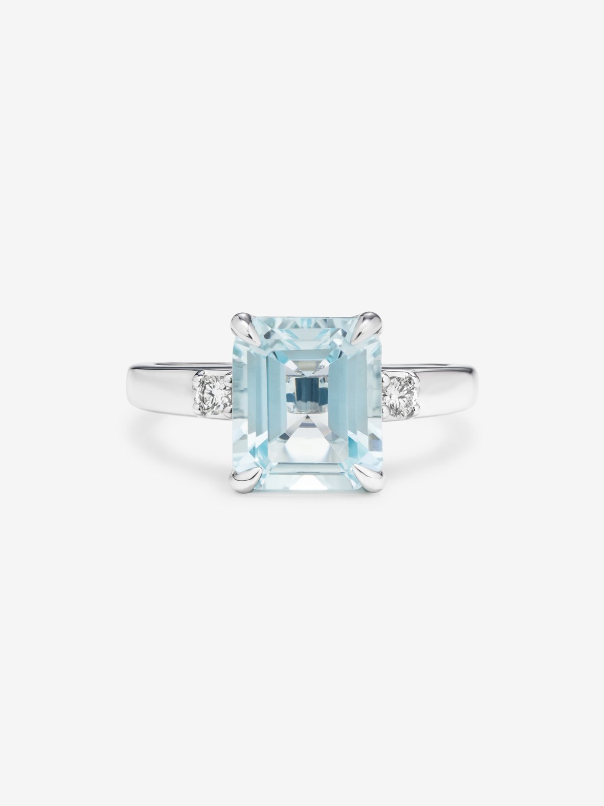 Anillo tresillo de plata con piedra topacio azul Sky central de 3,60cts y diamantes