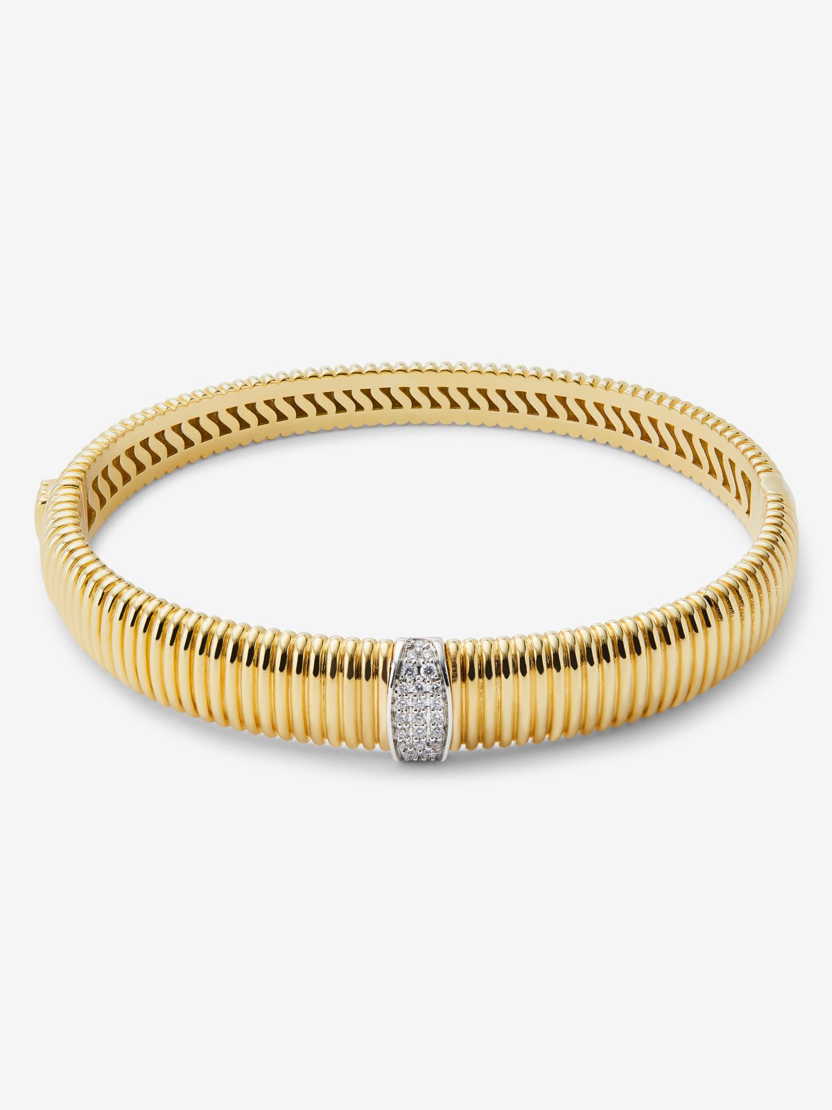 Pulsera rígida gallonada de oro blanco y amarillo de 18K con pavé de diamantes en talla brillante con un total de 0,16 cts