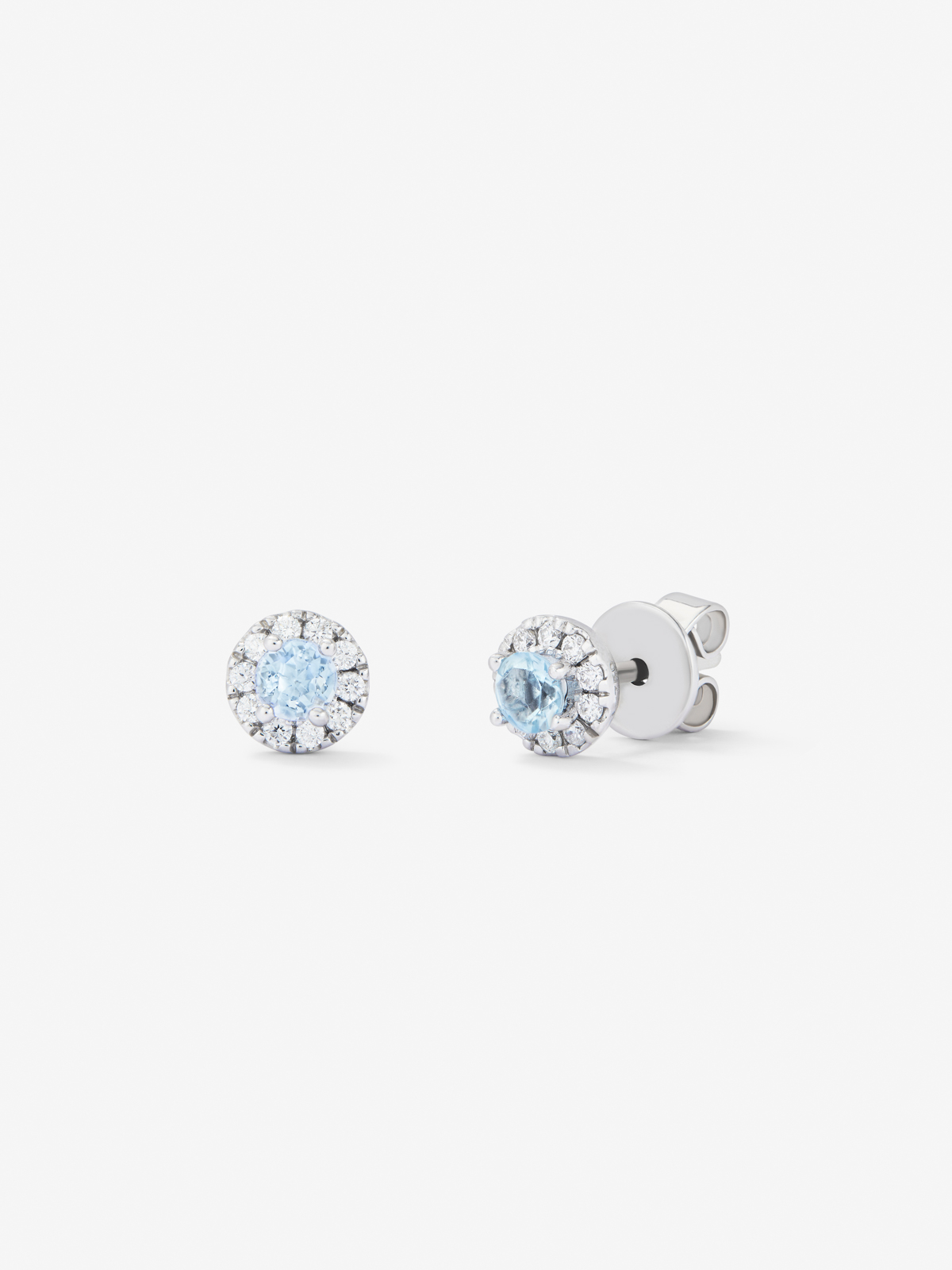 18K white gold halo earrings with aquamarine and diamond.