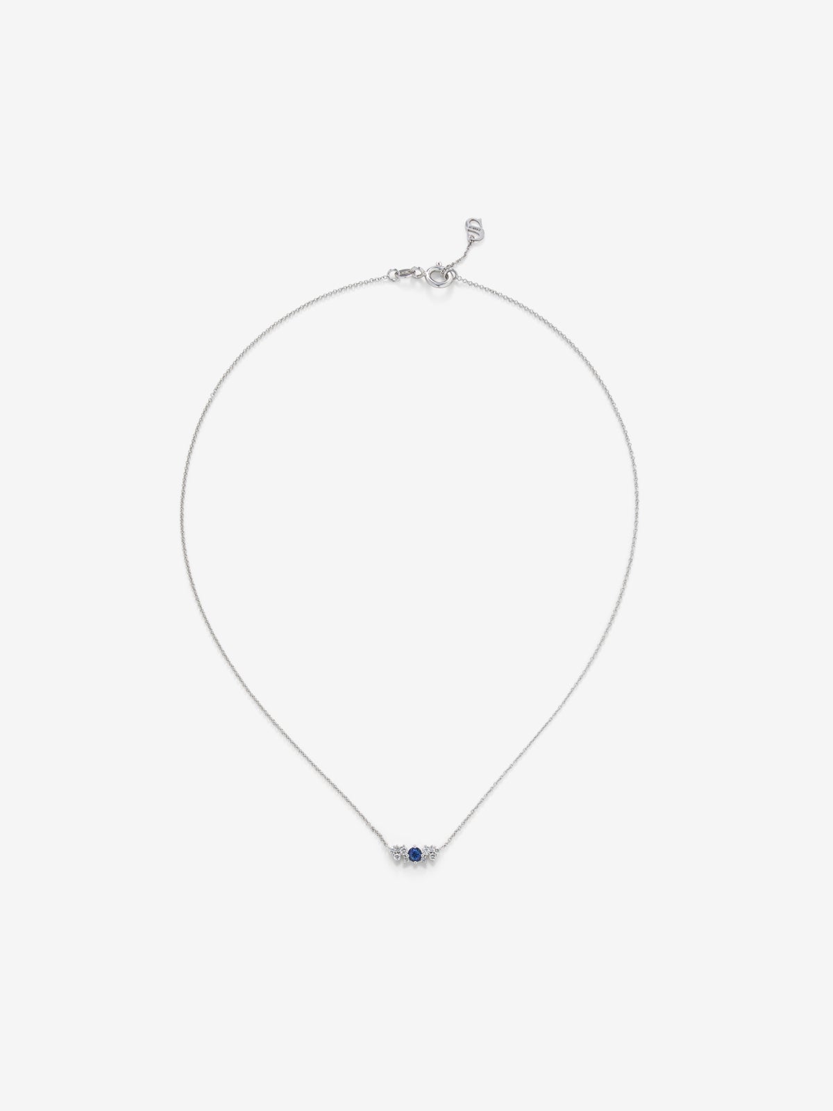 18K white gold pendant chain with sapphire and diamonds.