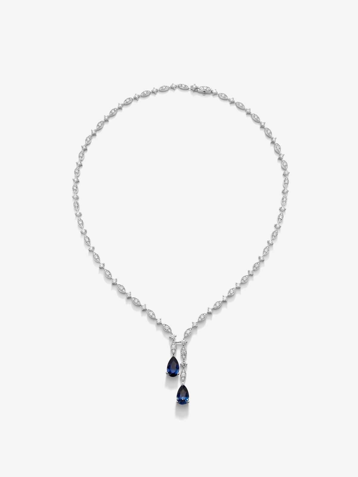 18K white gold necklace with pear-cut intense blue sapphires and 6.48 ct brilliant-cut white diamonds