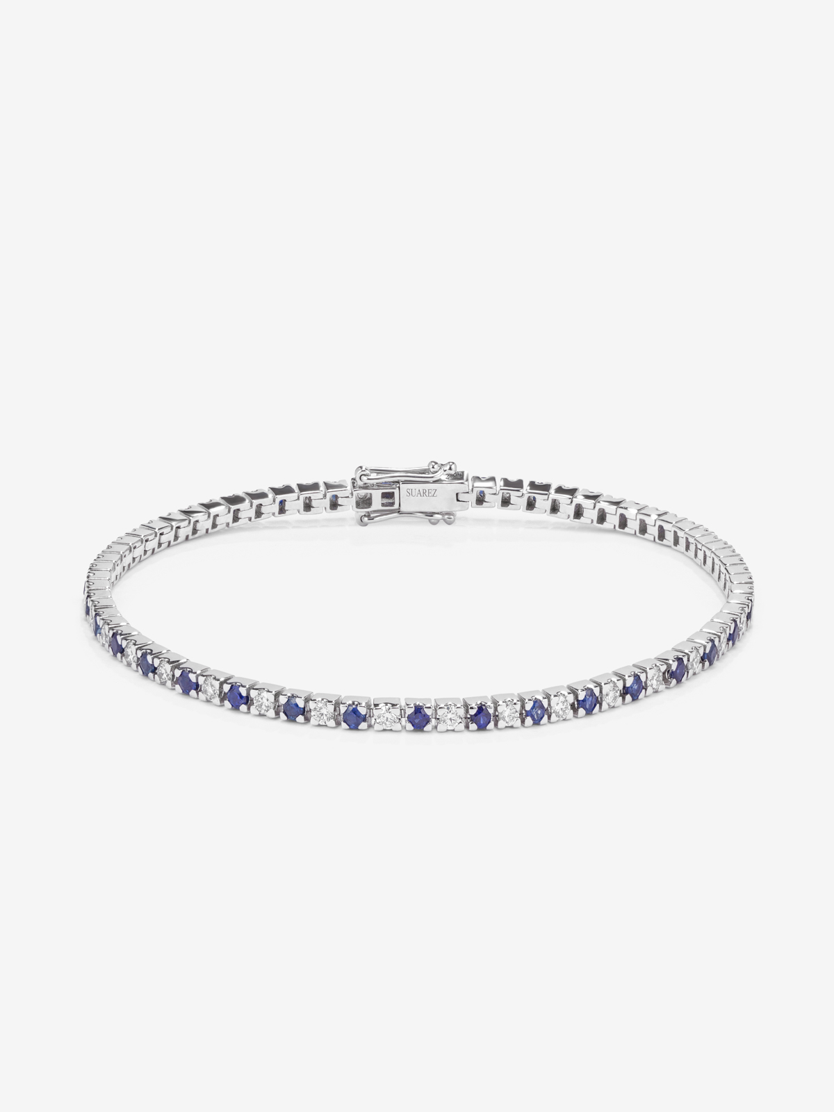 18K white gold riviere bracelet with diamond and sapphire