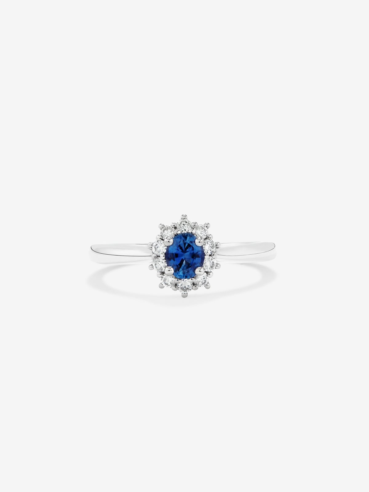 18K white gold ring with oval-cut royal blue sapphire and brilliant-cut diamonds