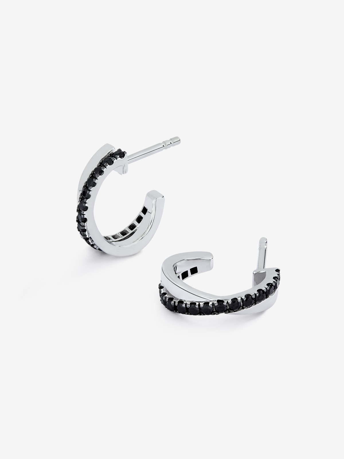 Thin cross hoop earrings made of 925 silver with spinels.