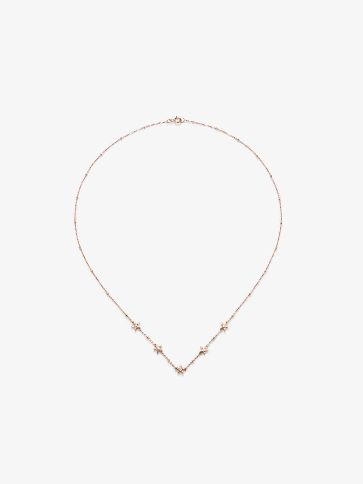 18kt Rose gold star pendant with diamonds