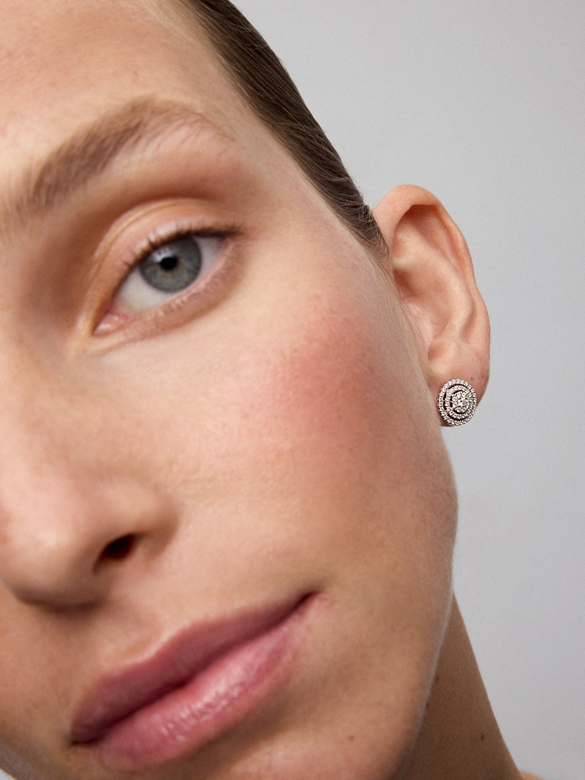 18K white gold earrings with pave diamonds.
